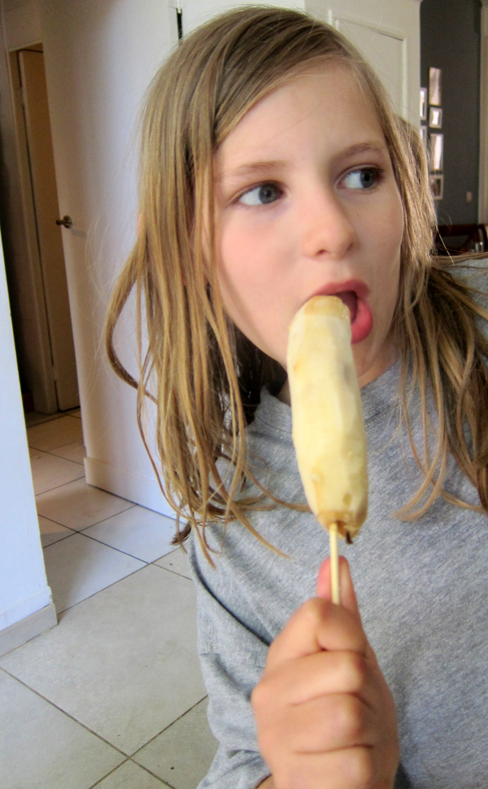 Frozen banana on a stick