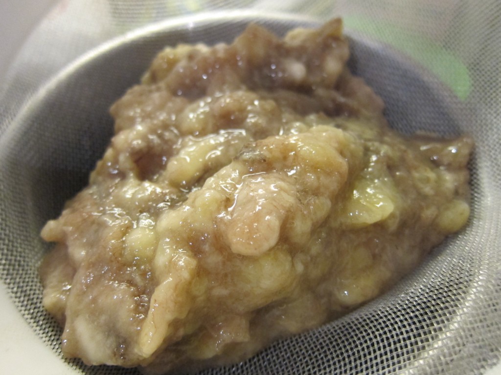 To get rid of any unwanted fibres, the mashed bananas are passed through a sieve