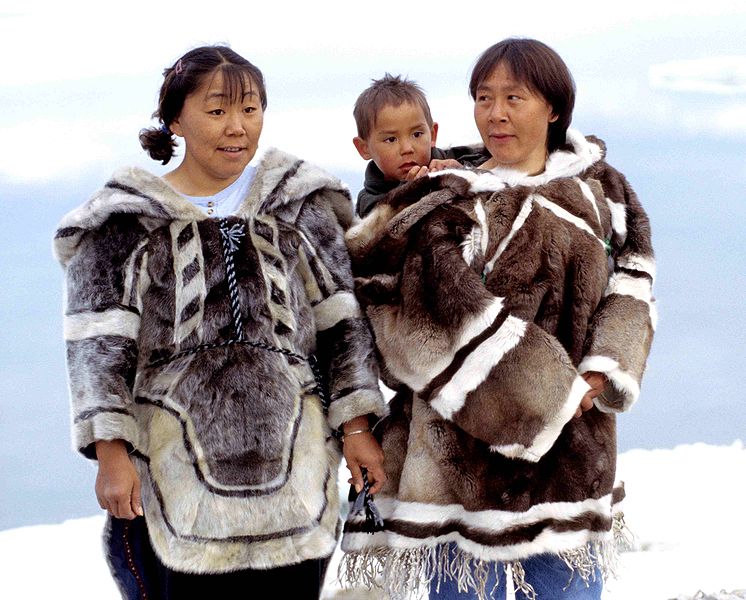 Inuit traditional clothing (left seal, right caribou) photo by Ansgar Walk 1999