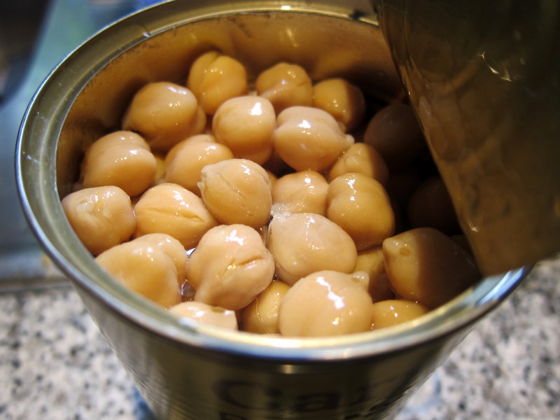 The quick and easy way to aquafaba - open a can of chickpeas and collect the liquid!