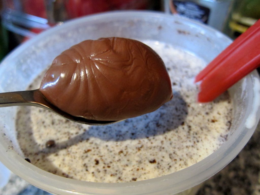 Once the dairy/starch/sugar-mixture has gone through the first stage of heating, add the flavours. As for the Nutella, 2-3 hearty teaspoons is all that will be required to flavour the ice cream sufficiently.